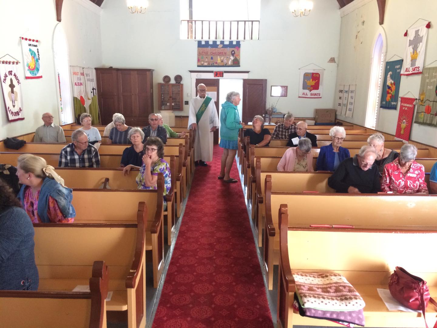 On July 21, 2024, a parish service was held at St. Mark's Church in Mill Cove. It was very nice to see such a great crowd! The altar flowers were mostly dark pink rambling roses with an Asiatic Lily and Shasta Daisy in each bouquet along with Lady's Mantle, Snowball Bush, white Hydrangea and Astilbe, pink Spirea, calla Lily and leaves.
